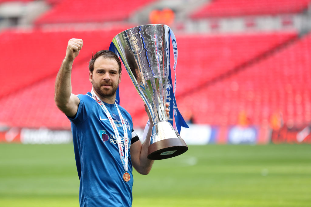 Brett Pitman with the EFL Trophy for Portsmouth.