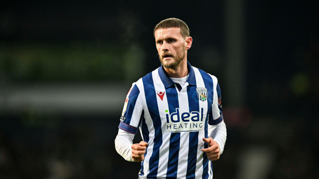 John Swift playing for West Brom in their home kit.