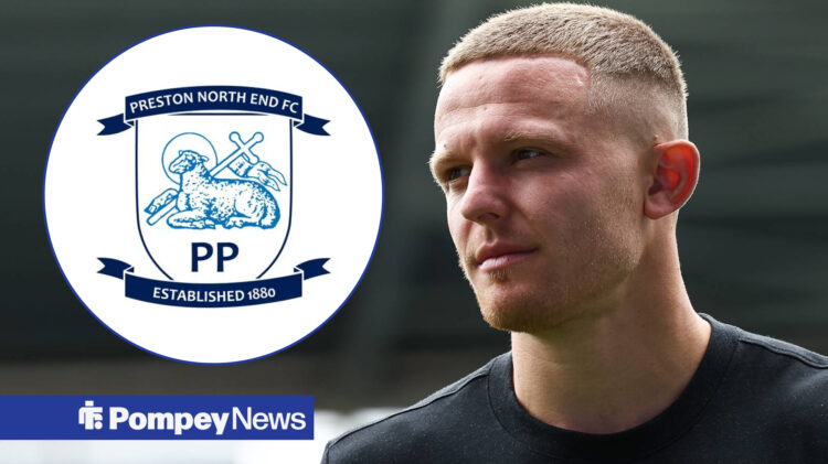 Colby Bishop looking at the Preston badge