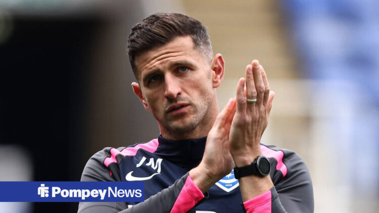 Portsmouth manager John Mousinho applauds.