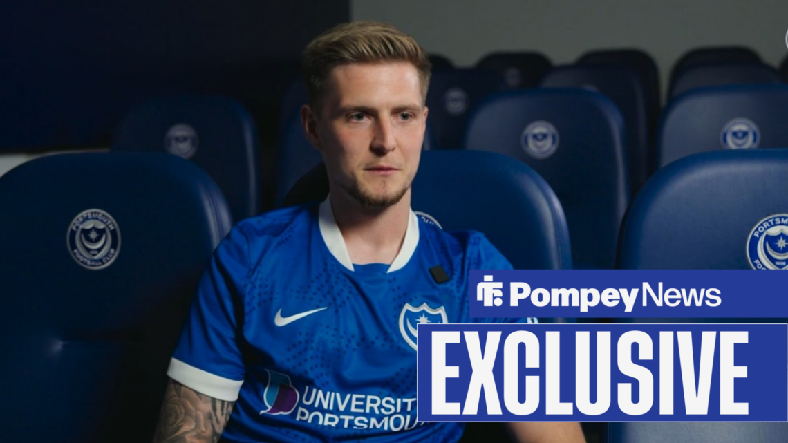 Josh Knight interviewed in Portsmouth home shirt with Exclusive tag