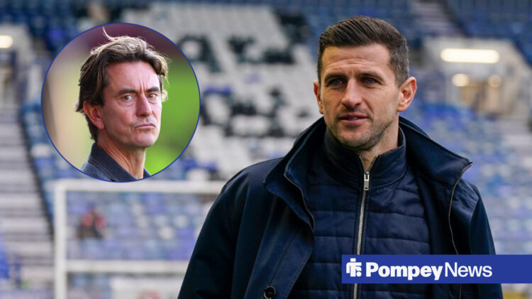 Portsmouth boss John Mousinho looking toward Tottenham manager Thomas Frank