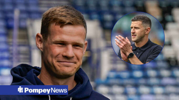 Rob Atkinson smiling, John Mousinho clapping in circle