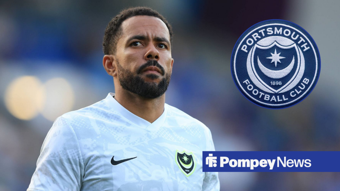 Jordan Archer in Portsmouth top with Portsmouth badge in circle