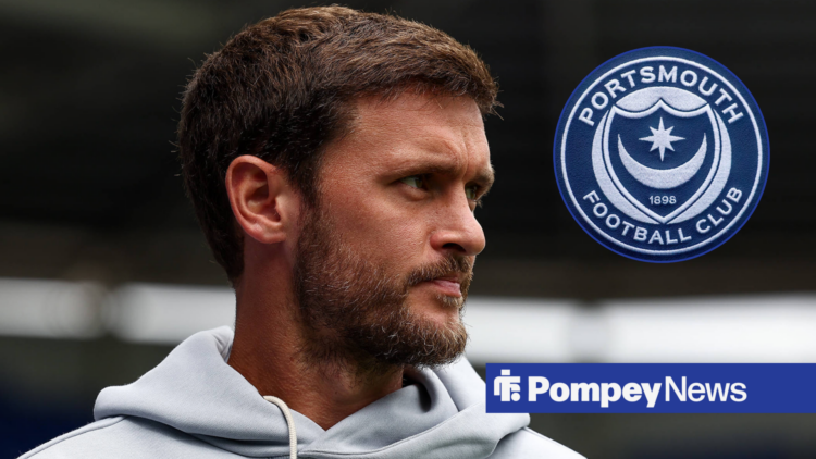 John Swift looks over to Portsmouth badge in circle