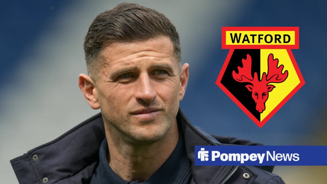 John Mousinho looking at Watford badge