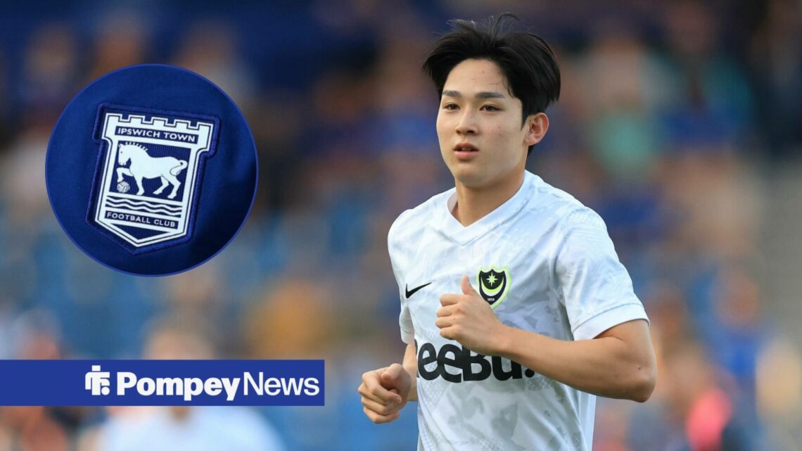 Yang Min-hyeok jogging with Ipswich badge in circle