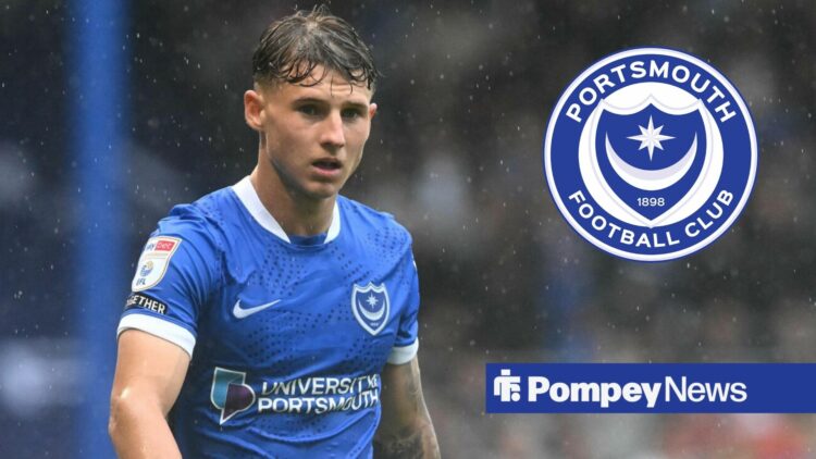 Adrian Segecic in Portsmouth home shirt with Portsmouth badge in circular inset