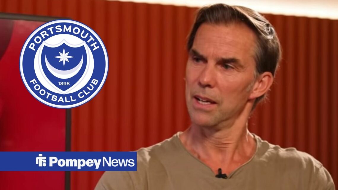 Jo Tessem in interview with red curtains and Portsmouth badge in circular inset