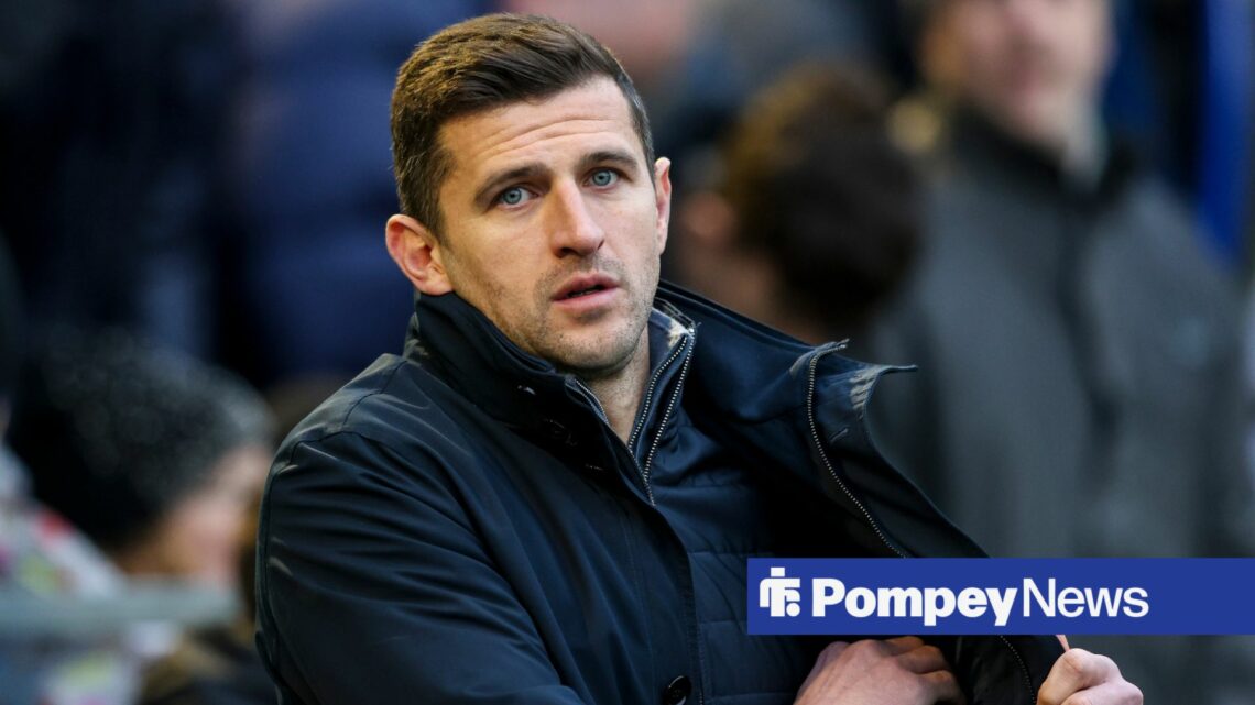 John Mousinho looking solemn in dugout