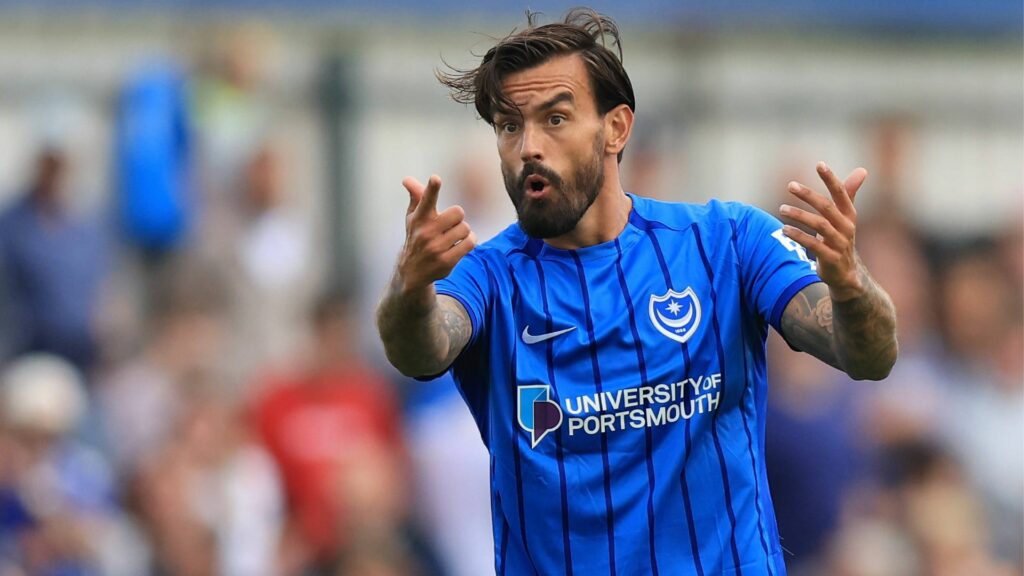 Marlon Pack urges on his Portsmouth teammates