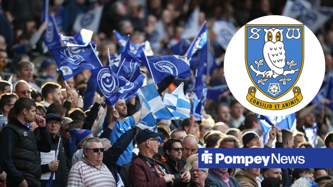 Portsmouth fans with blue flags and Sheffield Wednesday badge inset