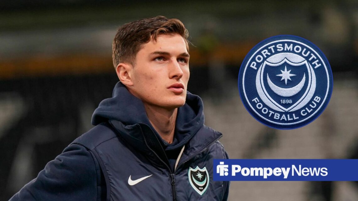 Freddie Potts looking at Portsmouth badge in circle