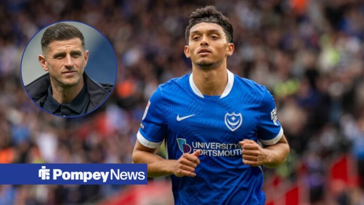 Andre Dozzell in Portsmouth home shirt with John Mousinho in circular inset
